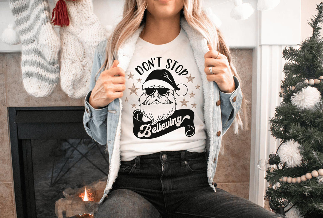 Shirts & Tops-Don't Stop Believing (Santa) T-Shirt-Jack N Roy